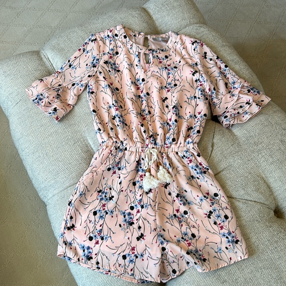 Floral romper with ruffle sleeves